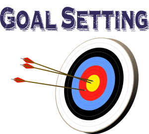 Target with arrows captioned goal setting